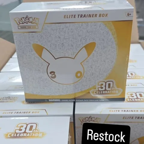 A stack of Pokémon 30th Celebration Elite Trainer Boxes just restocked